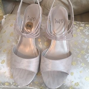 Shoes metallic dress wedge. Never worn